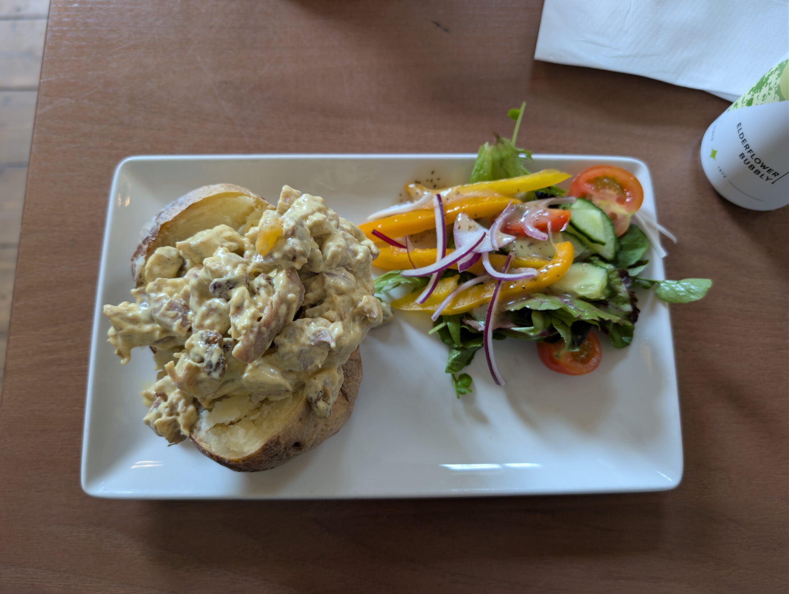 Jacket potato topped with creamy coronation chicken