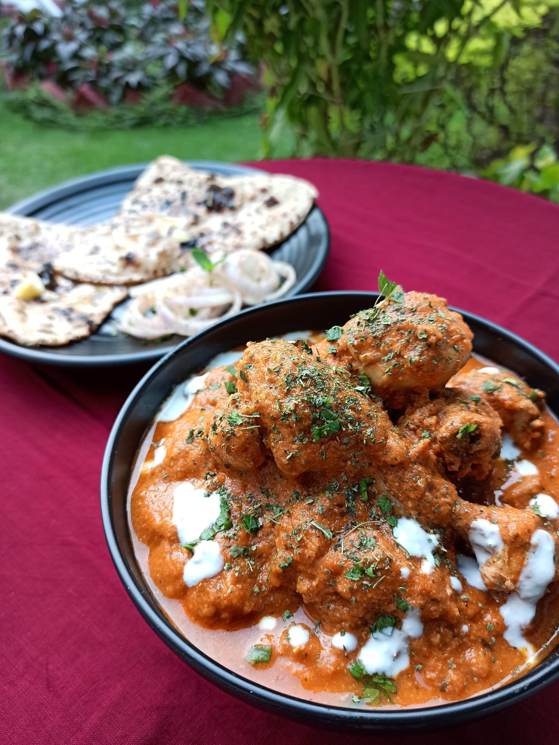 Restaurant-style butter chicken served with naan