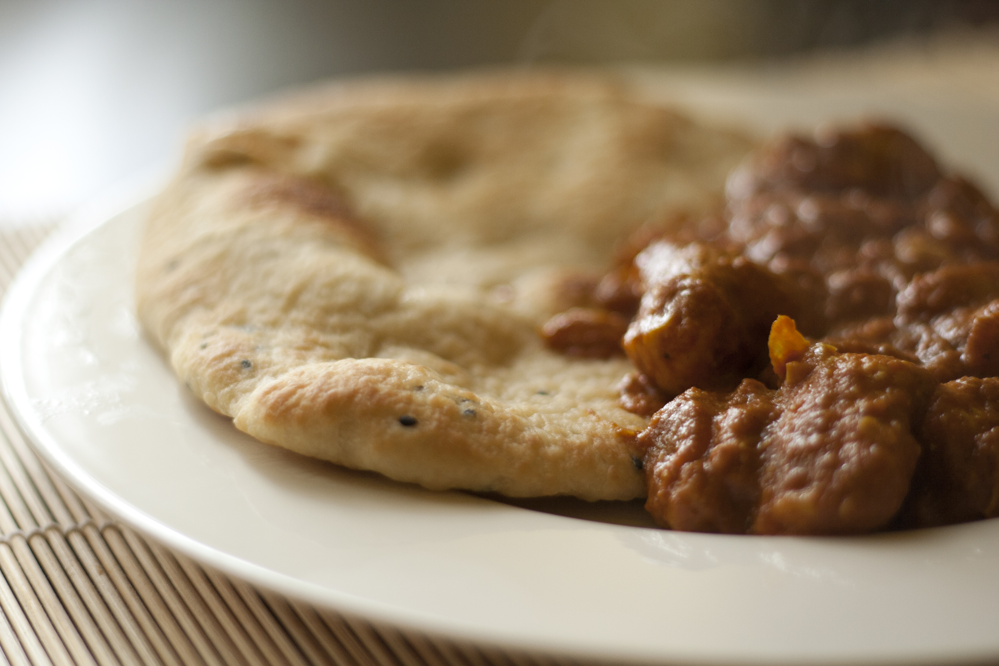 Creamy murgh makhani butter chicken in a serving dish