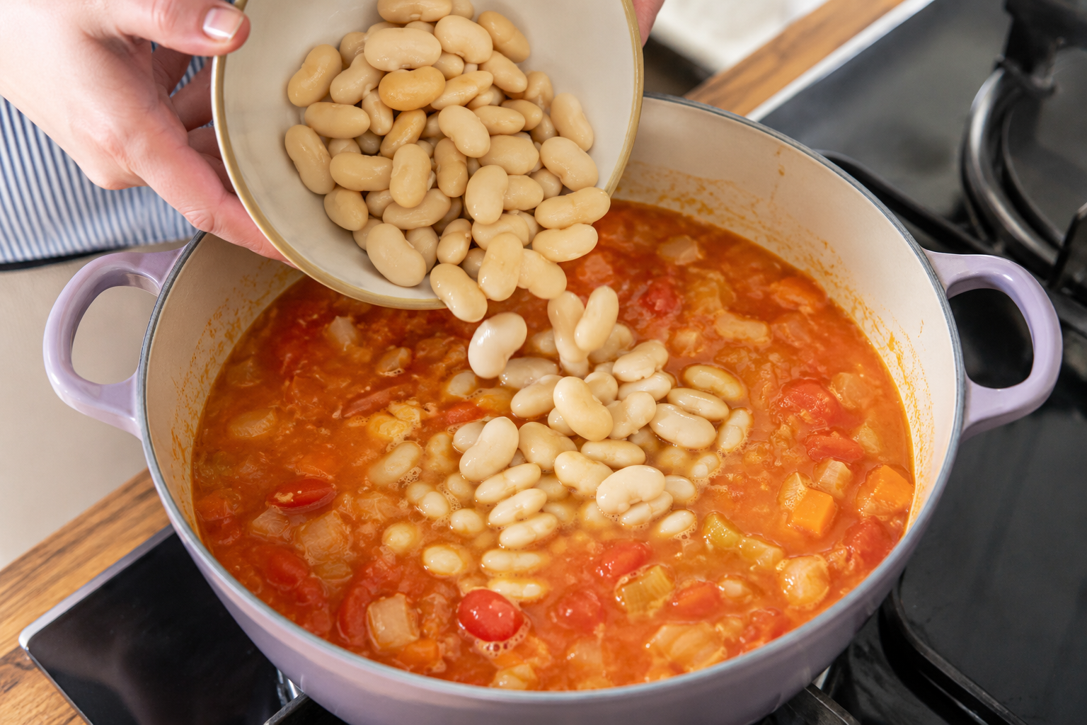 Butter beans added to tomato and vegetable soup base