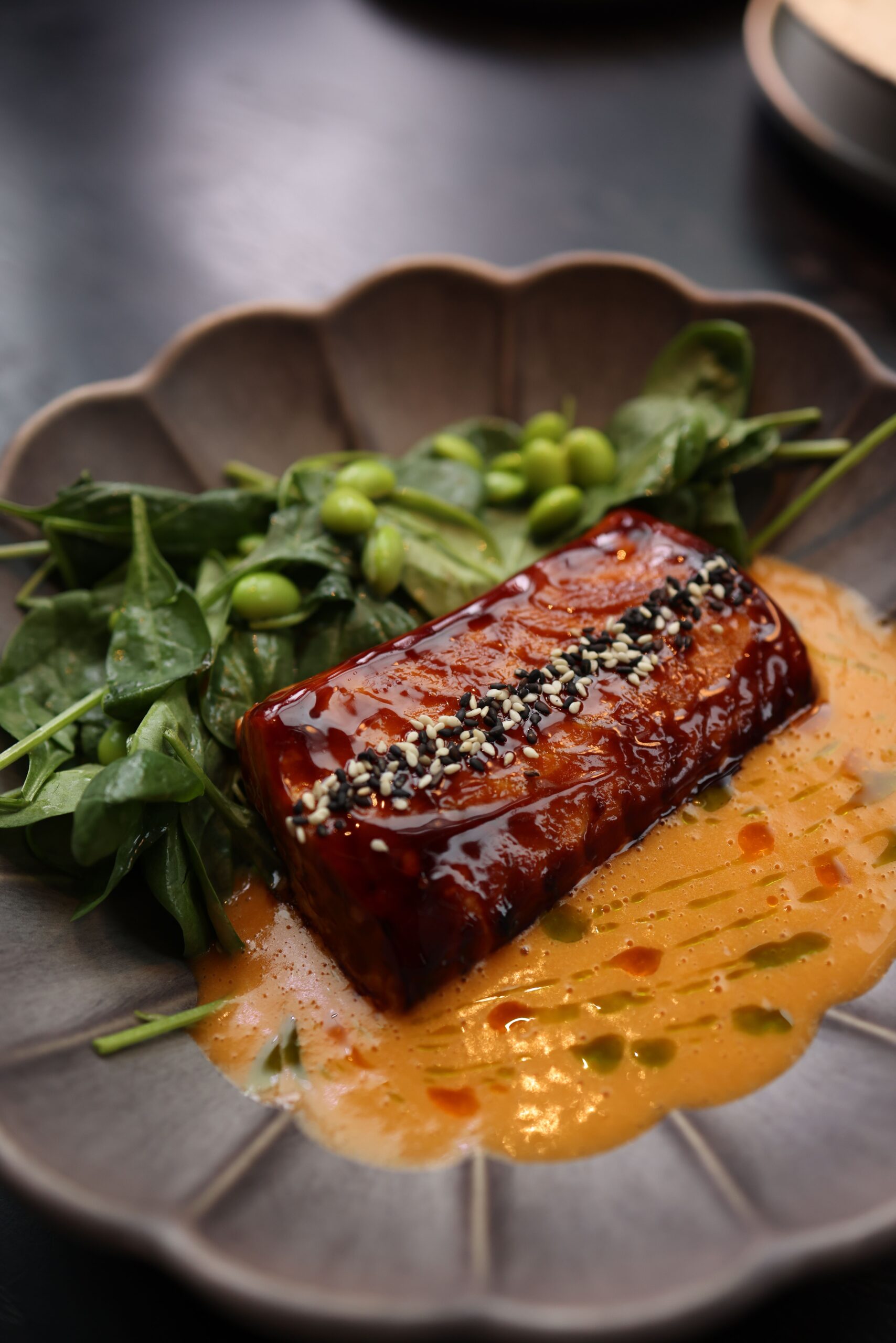 A honey garlic glazed salmon fillet with sesame seeds