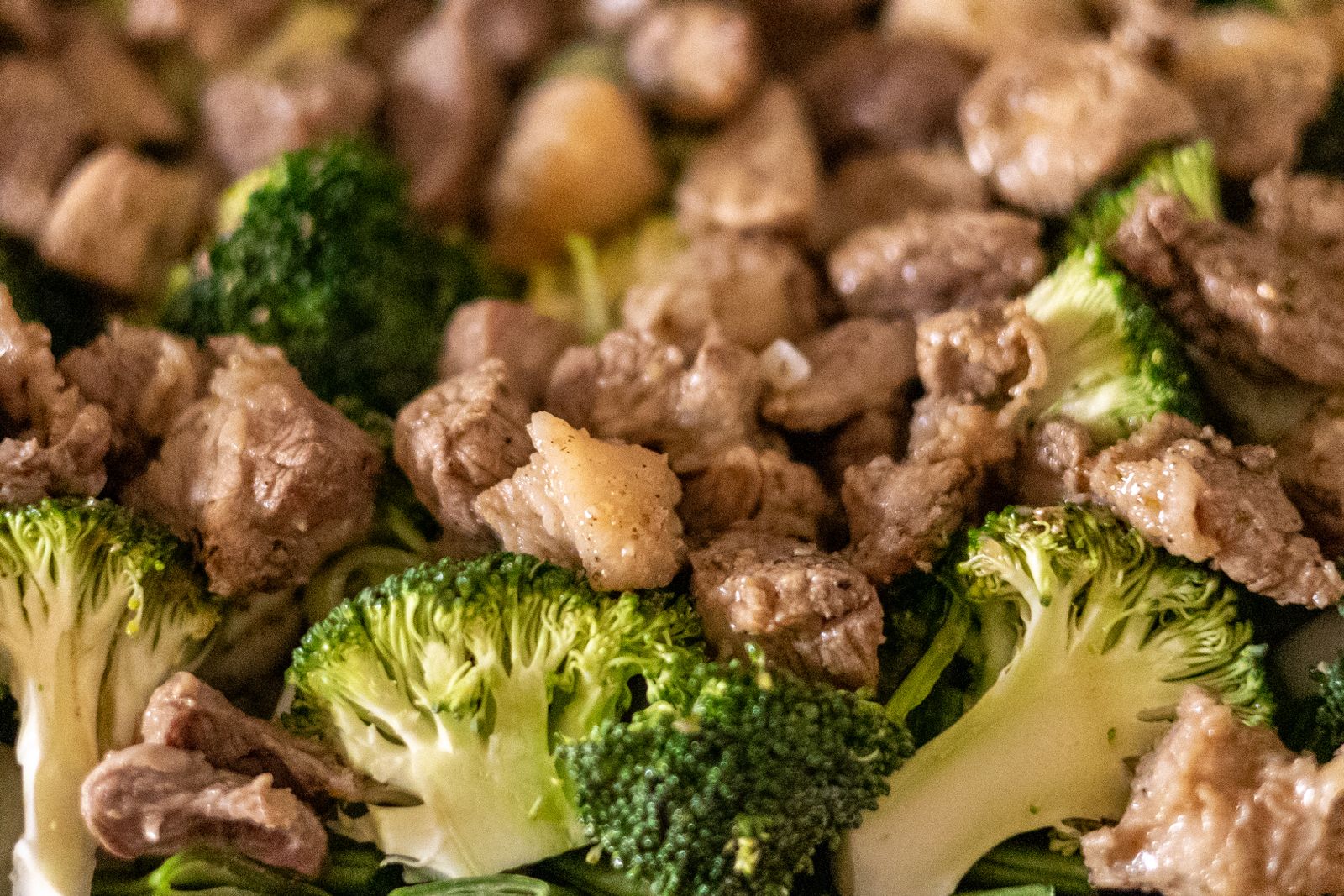 Close-up of beef and broccoli stir-fry glazed in a savoury low-carb sauce