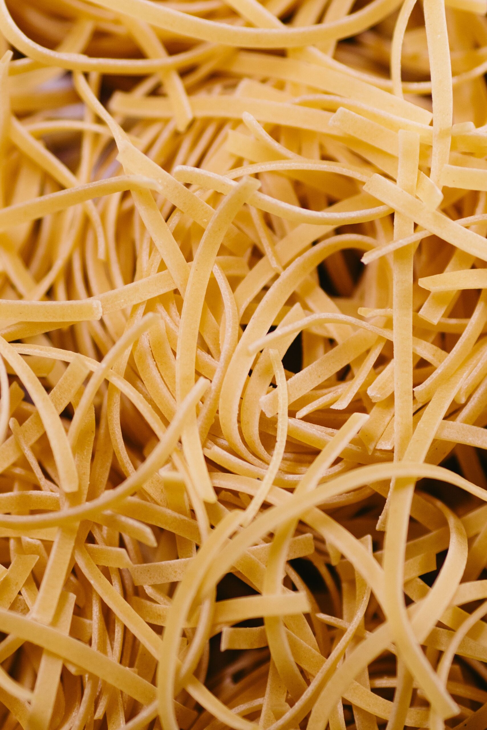 Uncooked egg noodles, the base for chicken noodle soup